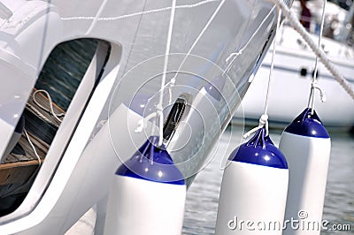 Hanging floater of white yacht Stock Photo