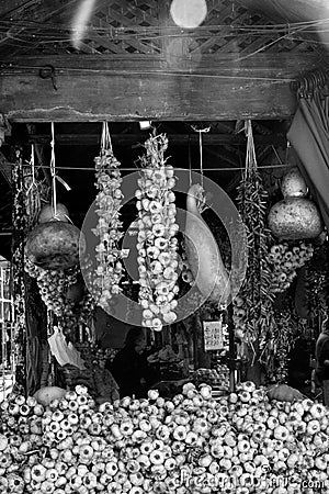 Hanging garlic for sale at Porto market Mercado do Bolhao, Portugal Editorial Stock Photo