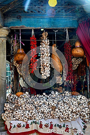 Hanging garlic for sale at Porto market Mercado do Bolhao.Porto, Portugal Editorial Stock Photo