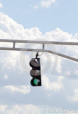 Hanging Green Traffic Signal Stock Photo