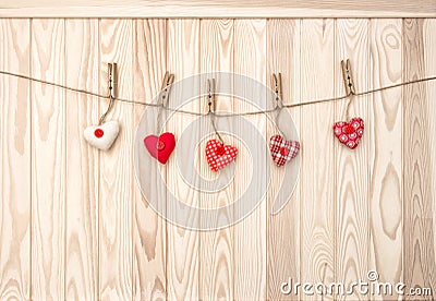 Hanging hearts wooden texture Valentines day background Stock Photo