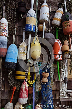 Hanging lobster nautical buoys on the wall Stock Photo