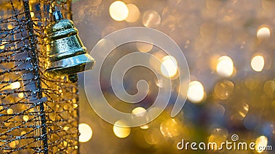 Hanging silver bell with light bokeh background Stock Photo