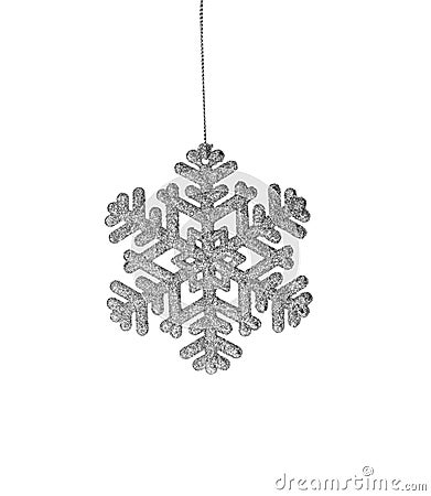 Hanging Silver Glitter Snowflake isolated on white background. Winter ornament Stock Photo