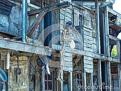 Hanging skeleton at wild west building in ghost town setting Editorial Stock Photo