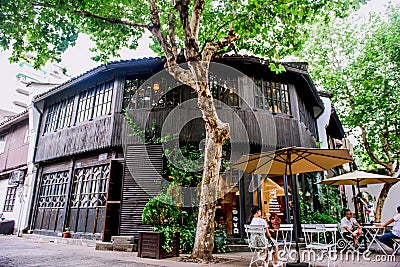 Hangzhou, China - August1, 2017: Street for tourists, traditional street food and soÐ³veniers, old historical architexture and Editorial Stock Photo