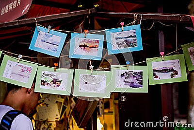 Hangzhou, China - August1, 2017: Street for tourists, traditional street food and soÐ³veniers, old historical architexture and Editorial Stock Photo