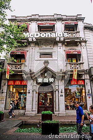 Hangzhou, China - August1, 2017: Street for tourists, traditional street food and soÐ³veniers, old historical architexture and Editorial Stock Photo