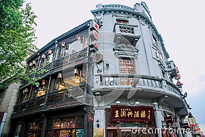 Hangzhou, China - August1, 2017: Street for tourists, traditional street food and soÐ³veniers, old historical architexture and Editorial Stock Photo