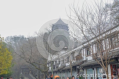 Unidentified chinese people walk in the walkway beside the xihu lakewest lake Editorial Stock Photo