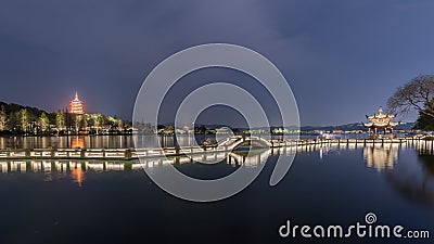 Hangzhou Leifeng Pagoda landscape at night, view from the Long Bridge Park beside West Lake, Hangzhou, China Stock Photo