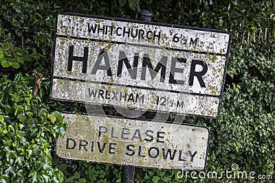 Old village road sign in Hanmer, Wales on July 10, 2021 Editorial Stock Photo