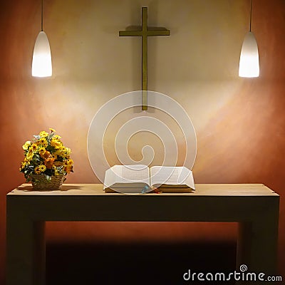 Simple puristic Spartan altar of the airport chapel from a table with a bouquet of flowers and an open Bible under a cross on the Stock Photo