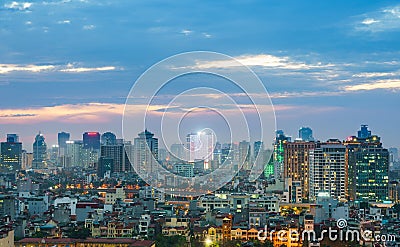 Hanoi cityscape at sunset with arising high buildings in Dong Da district Stock Photo