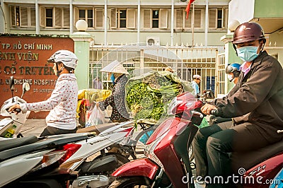 Hanoi Vietam March 3 2014 Life in Vietnam - Street by moto bike is an essential part of life in Vietnam, traffic of Editorial Stock Photo