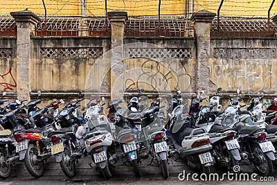 Hanoi, Vietnam - Busy street corner in old town during day time December 23, 2018 Hanoi Vietnam. Most vehicles on the roads of Vie Editorial Stock Photo