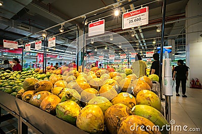 Hanoi, Vietnam - July 10, 2017: Fresh coconut on shelf in Vinmart supermarket, Minh Khai street. Editorial Stock Photo