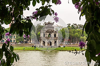 The ancient Turtle Tower in the middle of the Hoan Kiem lake in the city of Hanoi Editorial Stock Photo