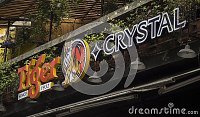 Tiger beer Crystal logo on the banner of a restaurant Editorial Stock Photo