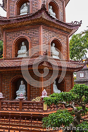 Hanoi, Vietnam - May 28, 2023: The Tran Quoc Pagoda, situated on a small island in Hanoi's West Lake, is an ancient Buddhist Editorial Stock Photo