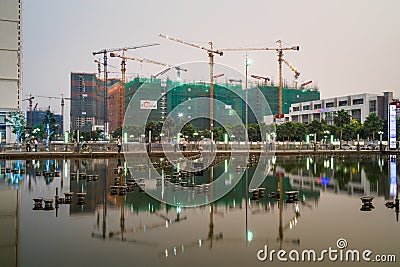 Hanoi, Vietnam - May 10, 2016: Under construction buildings with reflection in twilight period at Times City, Minh Khai street Editorial Stock Photo