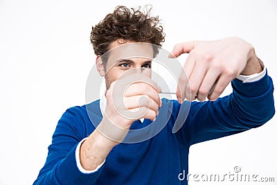 Hansome man making photo on smartphone Stock Photo