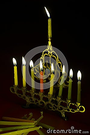 Hanuka candles in hanukkiya Stock Photo