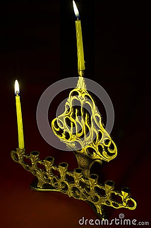 Hanuka candles in hanukkiya Stock Photo