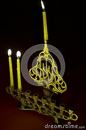 Hanuka candles in hanukkiya Stock Photo