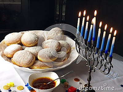 Hanuka lights and donuts Stock Photo
