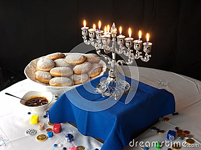 Hanuka lights and donuts Stock Photo