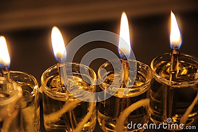 Hanukkah candles are lit in pure olive oil Stock Photo