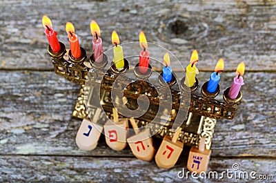 Hanukkah Chanukah Jewish holiday background with Hanukah Chanukkah menorah Judaism candelabra burning candles and traditional Stock Photo