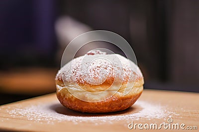 Hanukkah food doughnuts with jelly and sugar powder with bookeh background. Jewish holiday Hanukkah concept and background. Stock Photo