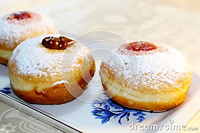 Hanukkah Sufganiyot Sufganiyah. Hanukkah Chanukah, Hanuka - Jewish Holiday. Symbol Hanukkah in Israel, Food Stock Photo