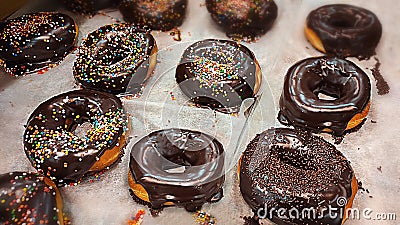 Hanukkah symbols: doughnut Sufganiyah or Sufganiyot with chocolate glaze Stock Photo