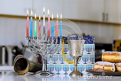Hanukkiah Menorah candlelights during a traditional celebration Hanukkah Jewish religion holiday symbol Stock Photo