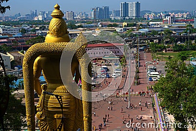 Hanuman Hindu god statue staring at Kuala Lumpur skyline Editorial Stock Photo