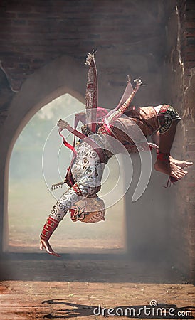 Hanuman monkey god somersaults in Khon or Traditional Thai Pantomime as a cultural dancing arts performance in masks dressed Stock Photo