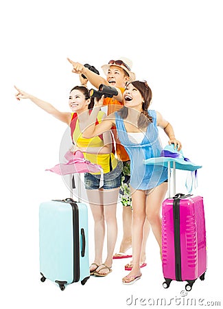 Happily young backpackers raise hands to point the direction Stock Photo