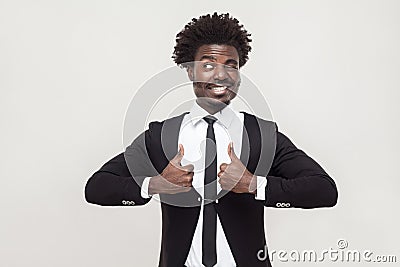 Happiness businessman looking at camera and thumbs up. Stock Photo