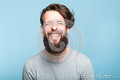 Happiness enjoyment laugh bearded exhilarated man Stock Photo