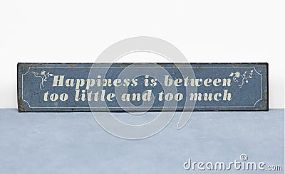 Happiness is between too little and too much positive life quote Stock Photo