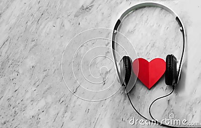Happiness, Wellness concept. Top view of Red heart and headphone Stock Photo