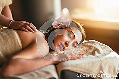 Happiness on woman`s face having relaxing thai massage Stock Photo