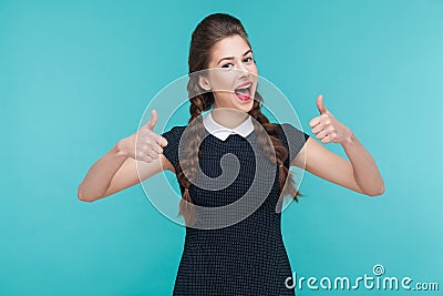 Happiness woman toothy smile and showing like sign at camera. Stock Photo
