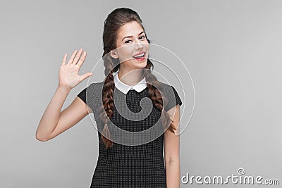 Happiness young budinesswoman showing hi sign Stock Photo