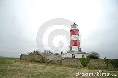 Happisburgh famous red and white lighthouse. Stock Photo