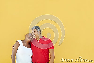 Happy 50 years old man embracing woman Stock Photo