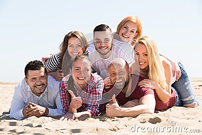 Happy adults at beach Stock Photo